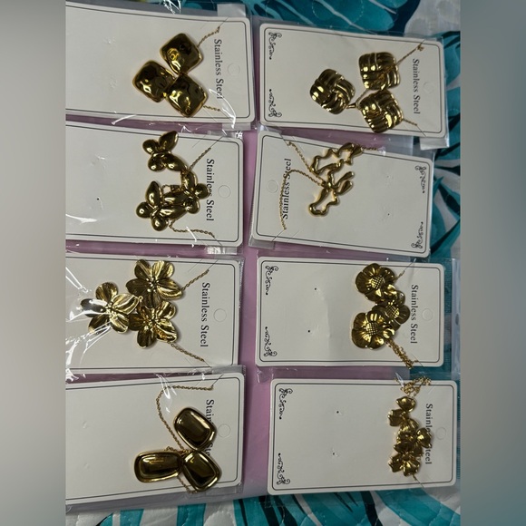 Jewelry - Gold Floral and Geometric Stainless Steel Necklace Set - 8 Pieces